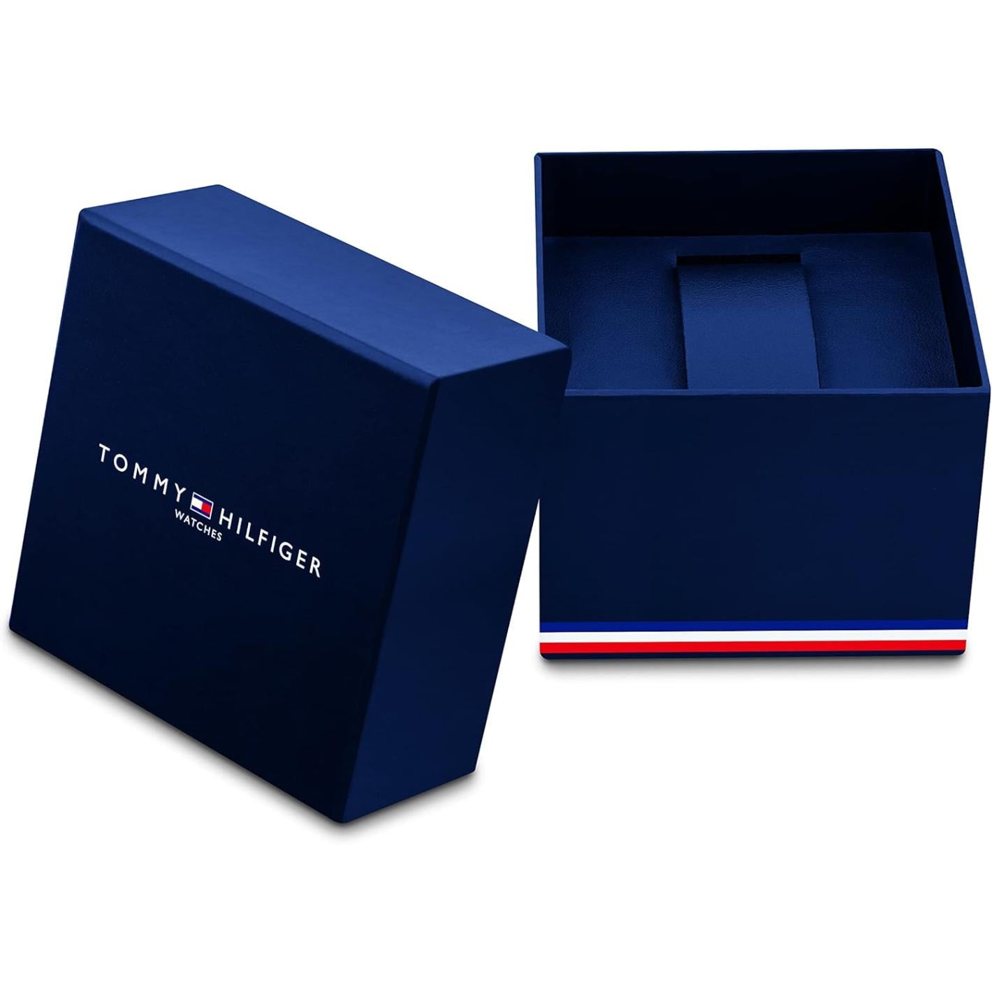 Caja original Tommy Hilfiger para reloj modelo 1782286 en color azul marino, estuche con tapa retirada y acolchado interior, vista abierta.