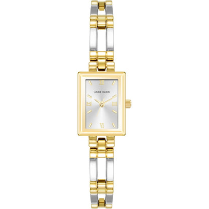 Reloj Anne Klein 10/4899SVTT vista frontal, caja rectangular dorada y brazalete bicolor oro y plata con esfera plateada.
