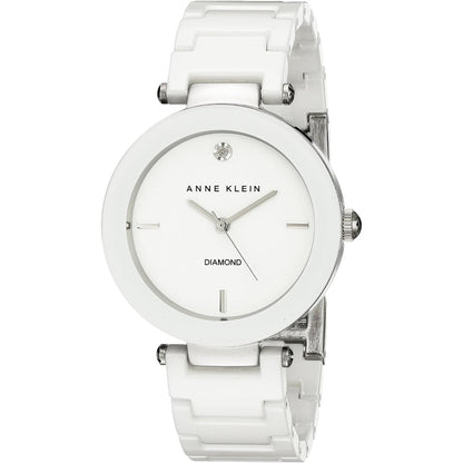 reloj Anne Klein AK/1019WTWT con esfera blanca minimalista, detalle tipo diamante en la esfera y correa blanca de resina vista frontal