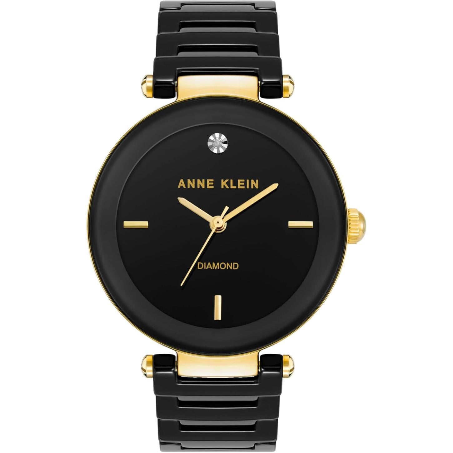 Reloj Anne Klein AK/1018BKBK vista frontal, esfera negra con diamante y brazalete negro con detalles dorados
