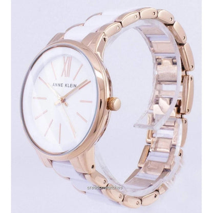Vista lateral del reloj Anne Klein AK/1412WTRG, caja tono oro rosa y brazalete bicolor blanco con detalles metálicos