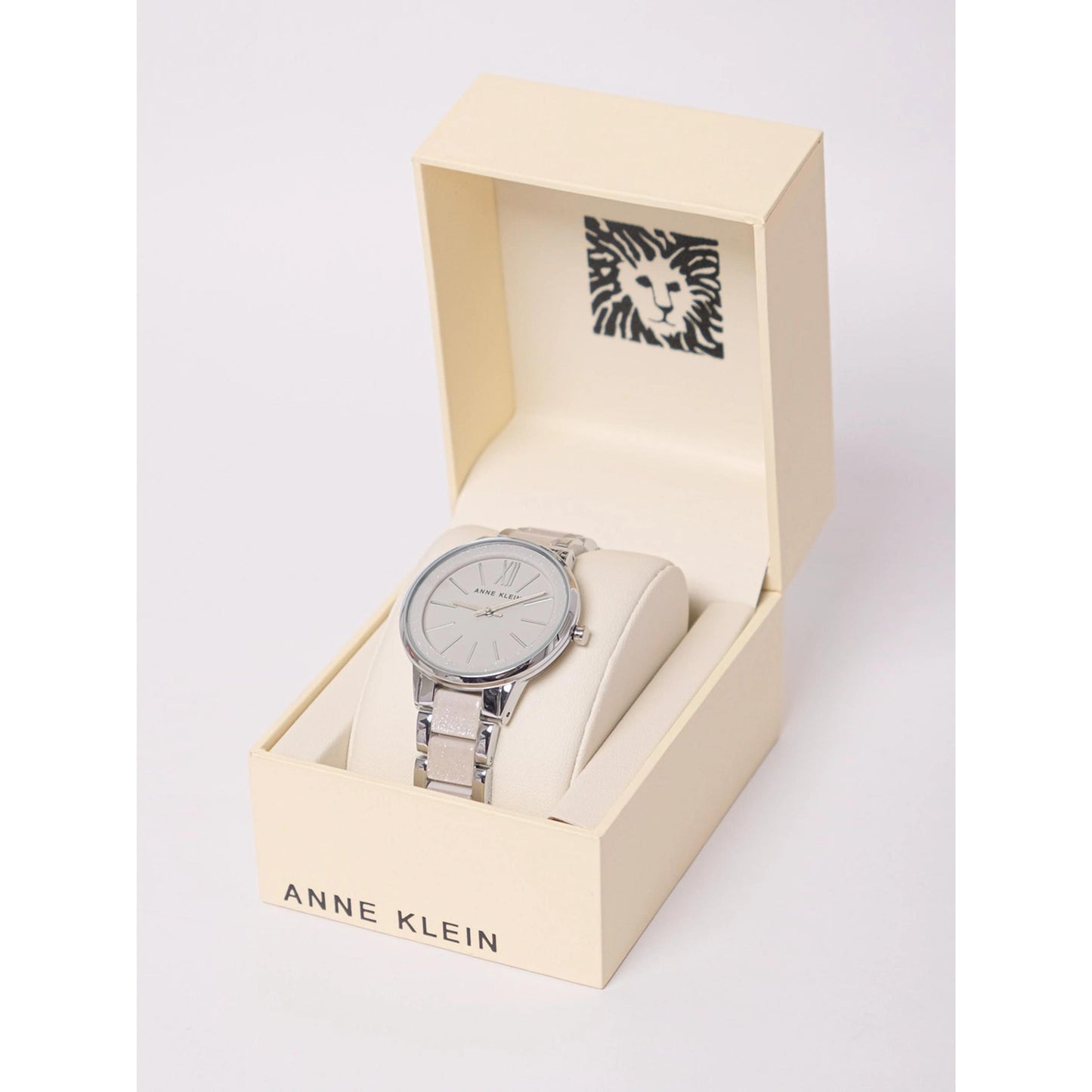Anne Klein AK/1413LGSV with grey dial and metallic silver bracelet presented inside the original Anne Klein watch box with cushioned interior.