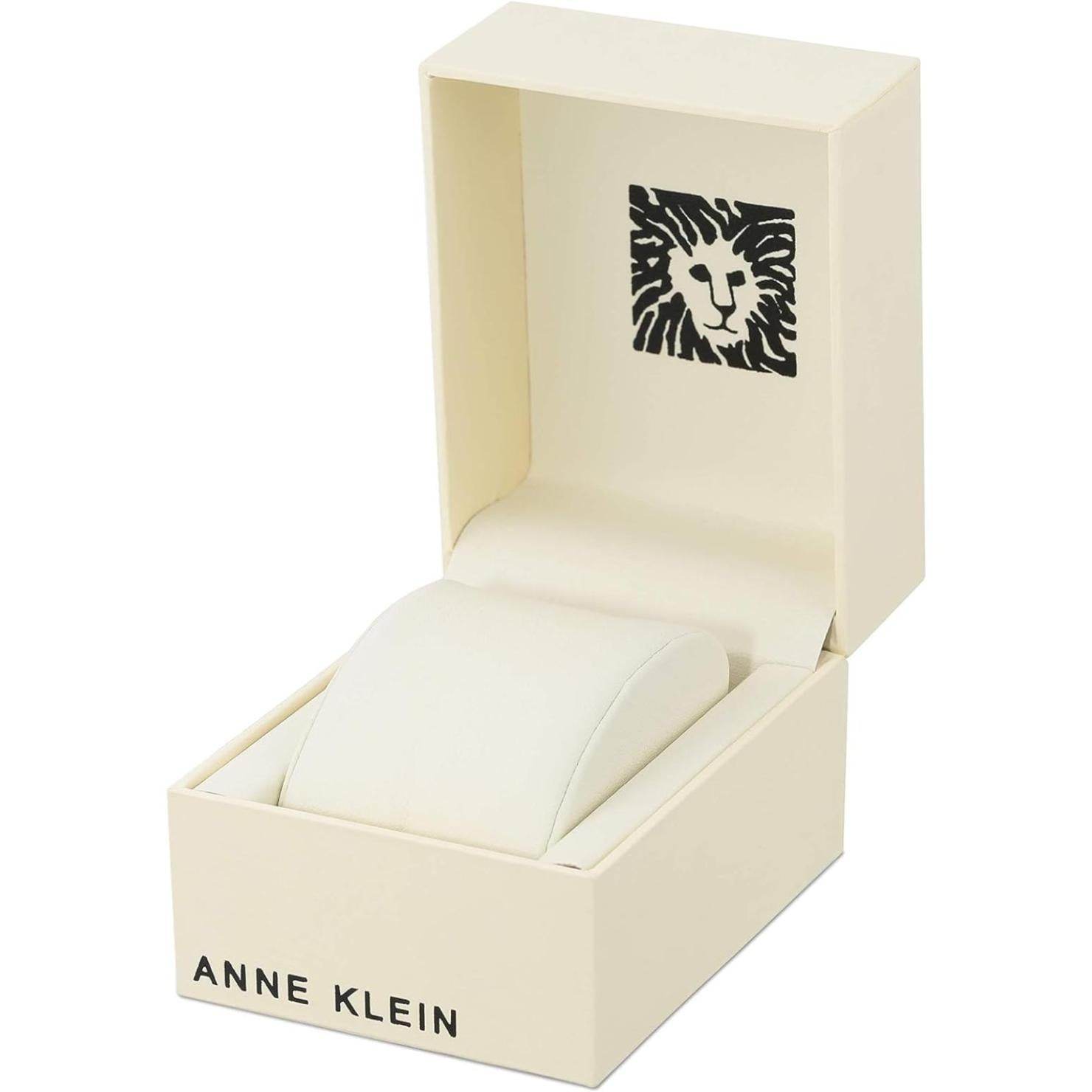 Caja original abierta Anne Klein para el reloj AK/1980BKGB, interior blanco con cojín y logotipo del león.