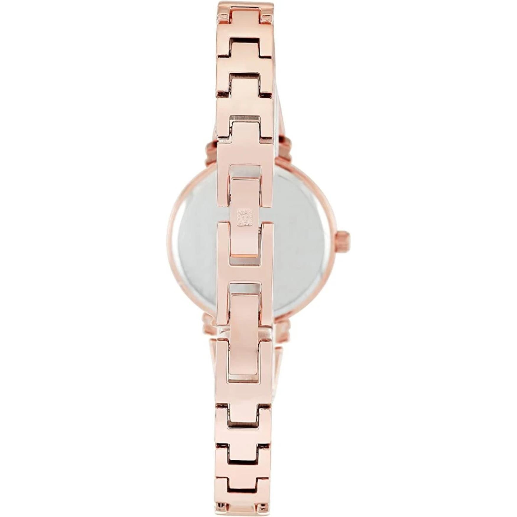 Anne Klein AK/2216BLRG with stainless steel rear case and rose gold-tone bangle bracelet with geometric link design.