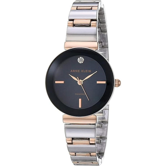 Anne Klein AK/2435NVRT with dark blue dial, single diamond accent marker, rose gold-tone hands, and two-tone stainless steel bracelet.