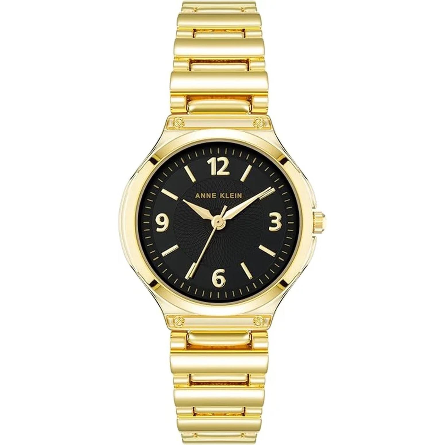 Anne Klein AK/3812BKGB with black textured dial, gold-tone hands and numeral markers, and polished gold-tone bracelet with decorative accents.