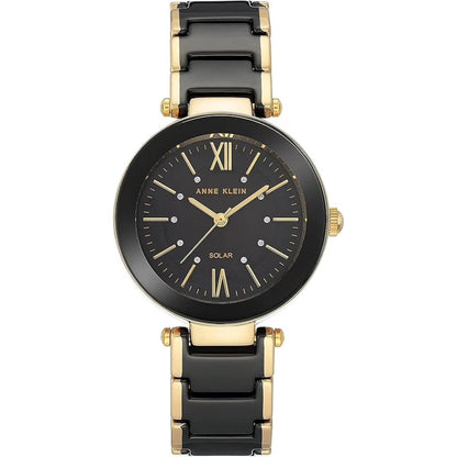 Anne Klein AK/3844BKGB women’s dress watch with black dial, crystal hour markers and black multi-link bracelet with gold-tone accents.