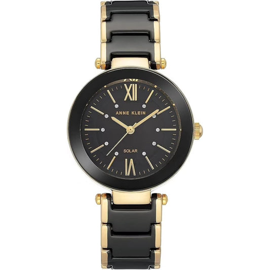 Anne Klein AK/3844BKGB women’s dress watch with black dial, crystal hour markers and black multi-link bracelet with gold-tone accents.