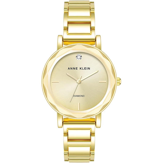 Anne Klein AK3966CHGB women's gold-tone dress watch featuring a champagne sunray dial, genuine diamond accent at 12 o’clock, slim three-hand display, and polished gold-tone stainless steel bracelet.