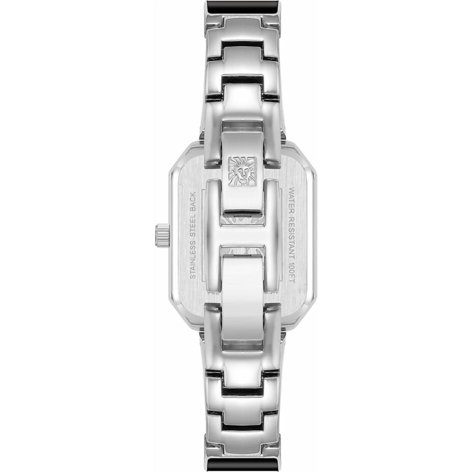 Anne Klein AK/4163BKSV with stainless steel rear case, engraved caseback details, and polished silver-tone bangle bracelet with jewelry clasp.
