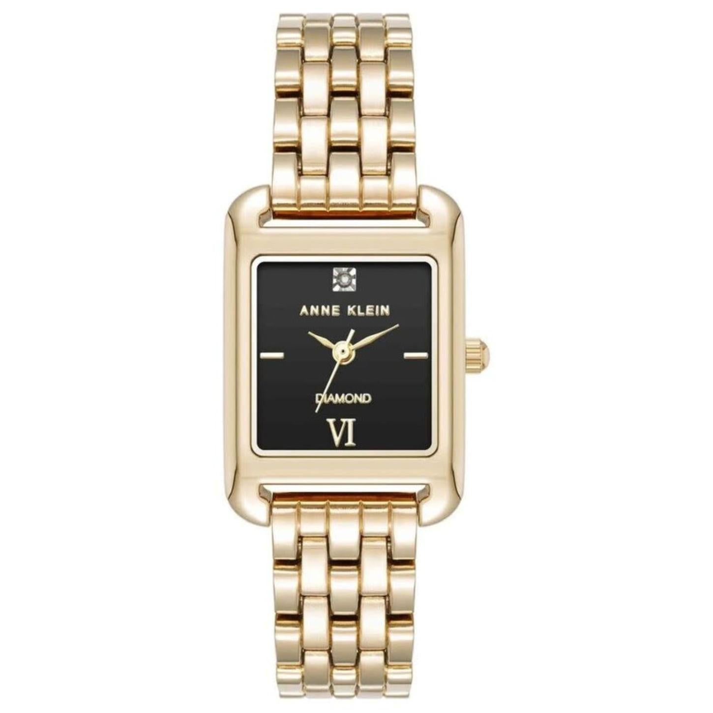 Anne Klein AK/5060BKGB women’s dress watch with black rectangular dial, diamond accent marker and gold-tone multi-link bracelet.
