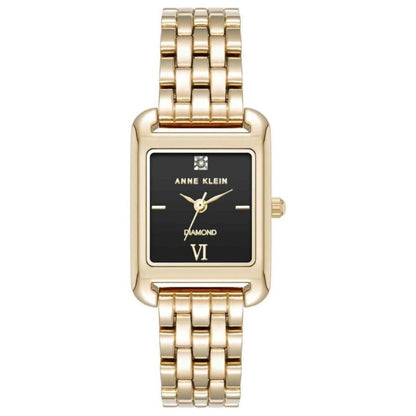 Anne Klein AK/5060BKGB women’s dress watch with black rectangular dial, diamond accent marker and gold-tone multi-link bracelet.