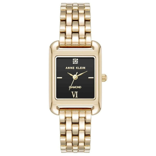 Anne Klein AK/5060BKGB women’s dress watch with black rectangular dial, diamond accent marker and gold-tone multi-link bracelet.