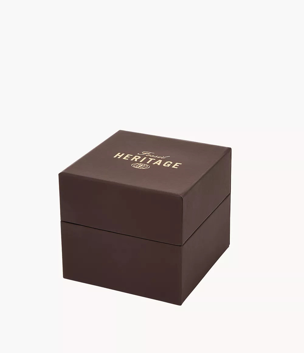 Caja marrón original de reloj Fossil Heritage, logotipo Heritage en la tapa, fondo blanco, presentación