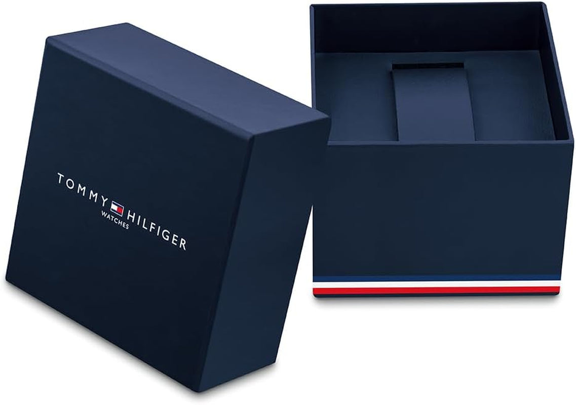 Caja original de reloj Tommy Hilfiger abierta, estuche de presentación oficial con interior acolchado.