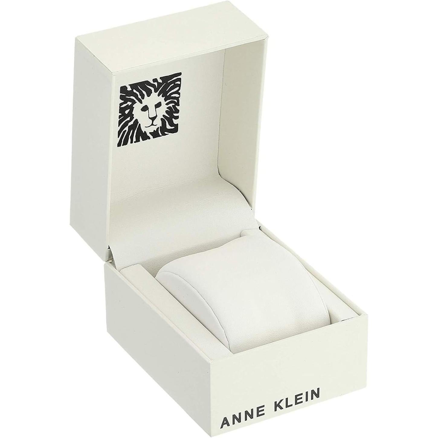 Caja original Anne Klein blanca para reloj, estuche de presentación abierto con cojín interior, vista frontal.