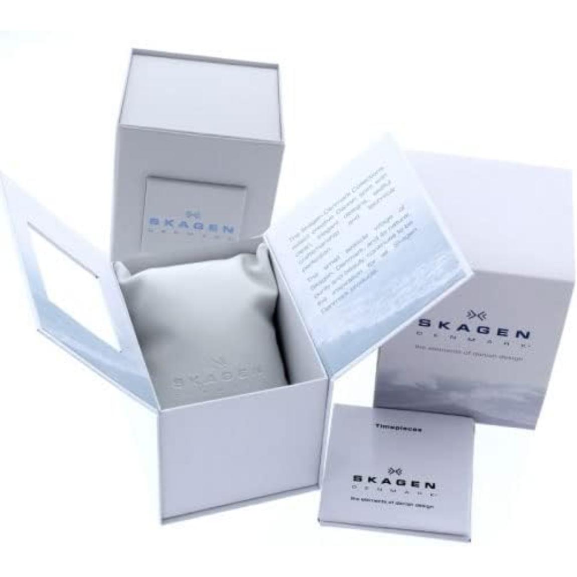 Vista abierta de la caja original Skagen Signatur Lille SKW2694 con estuche interior, documentación y embalaje oficial de la marca.