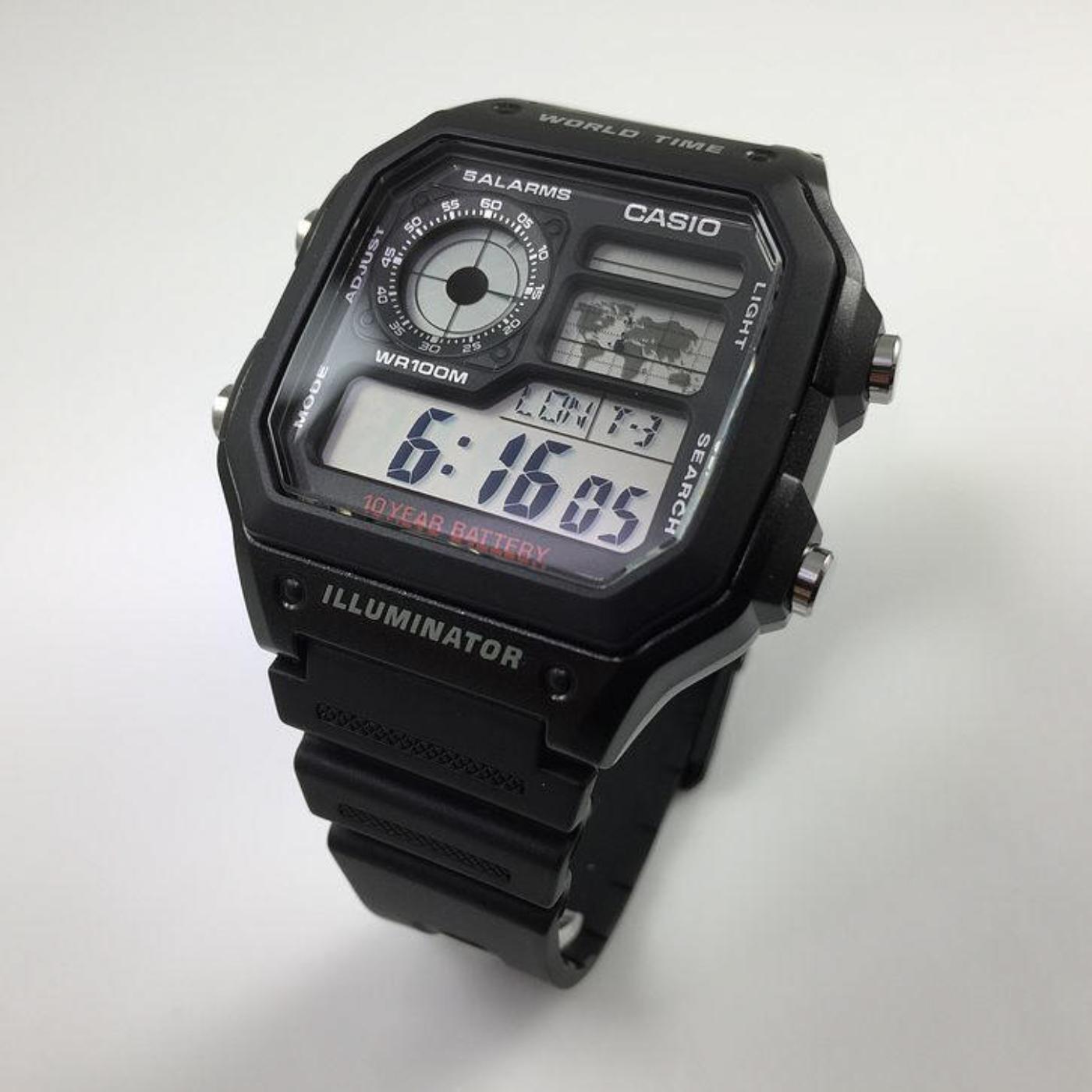 Casio AE-1200WH-1A digital world time watch with black resin case, multi display screen and map feature shown in angled view with durable sport design