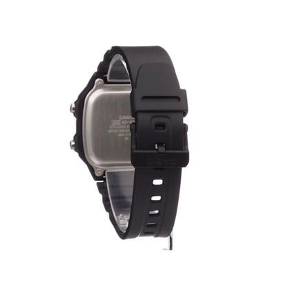 Casio AE-1200WH-1A digital watch shown from rear angle with stainless steel caseback and black resin strap with adjustable buckle