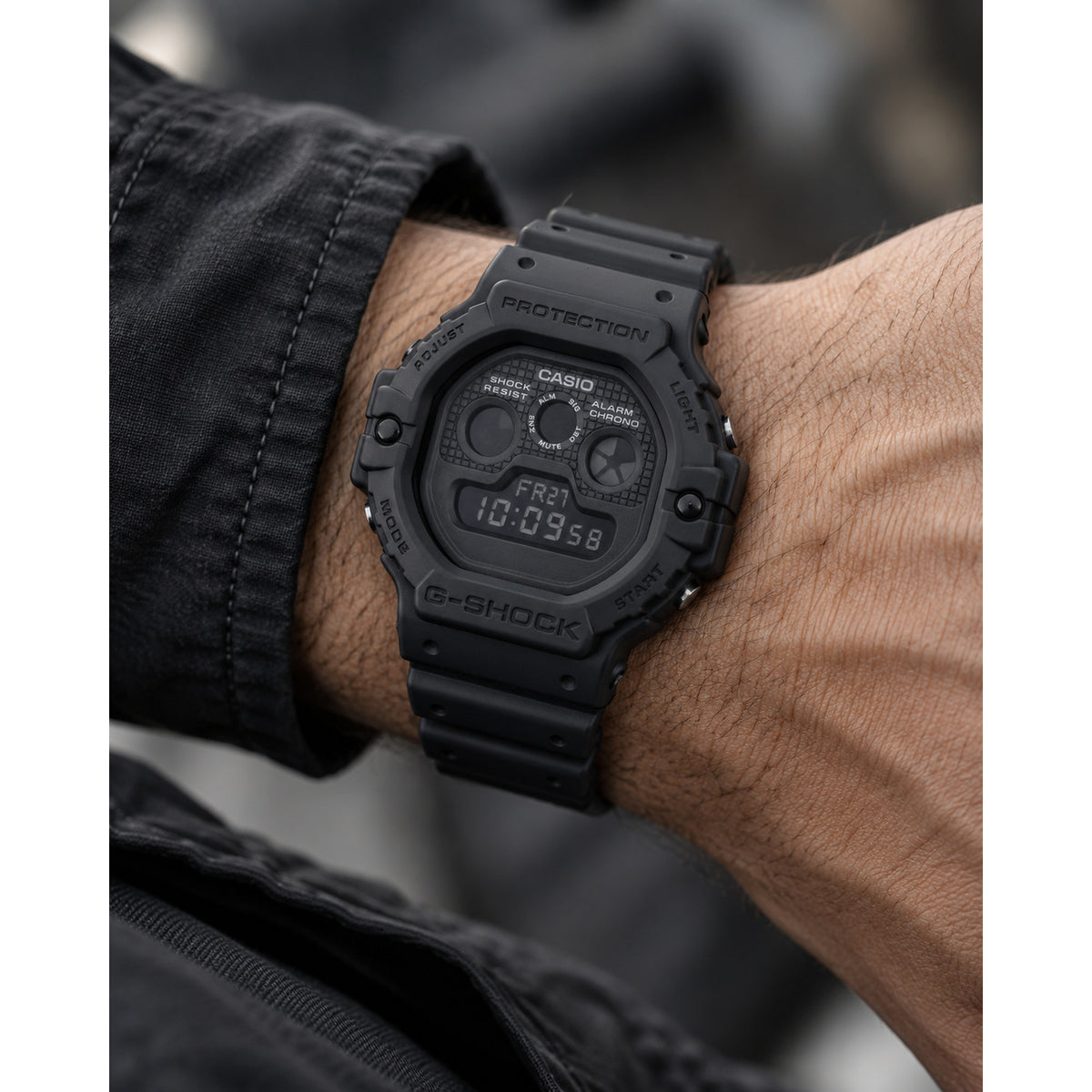 Casio G-Shock DW-5900UBB-1DR men's digital sport watch worn on wrist showcasing the all-black resin case and dark display