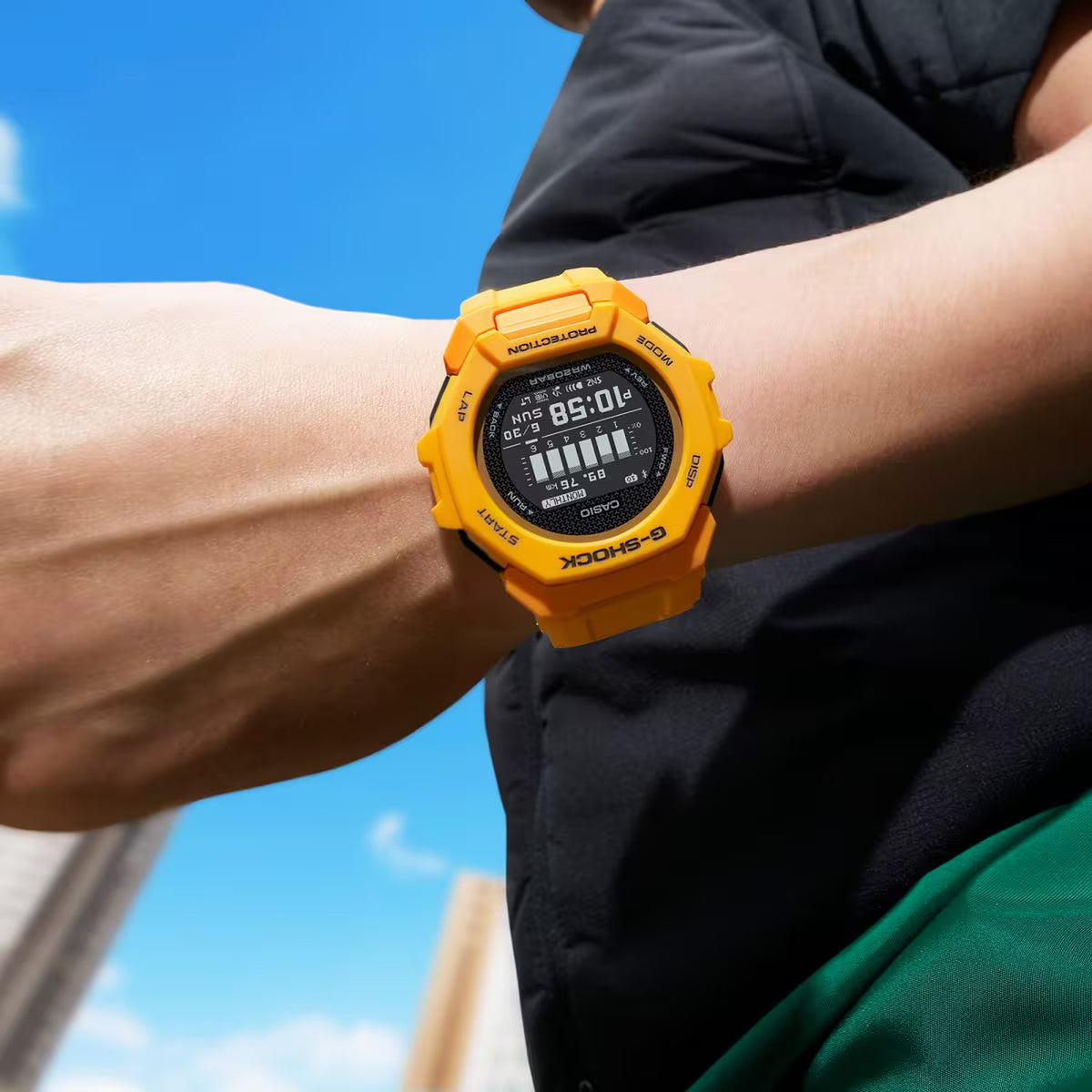 Casio G-Shock G-Squad GBD-300-9DR men’s digital sport watch with a bright orange case and strap, black digital display, and bold G-Shock bezel worn on the wrist.