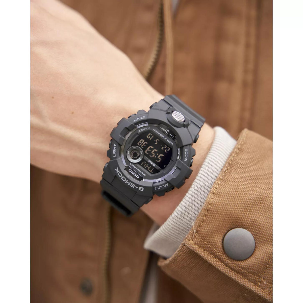 Casio G-Shock G-Squad GBD-800-1B men’s digital sport watch with a black case and strap, negative digital display, metallic button accents, and rugged bezel worn on the wrist.
