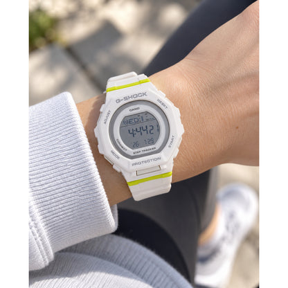 Casio G-Shock G-Squad GMD-B300SC-7DR women’s digital sport watch with a white case and strap, round digital display, and lime accents worn on the wrist.
