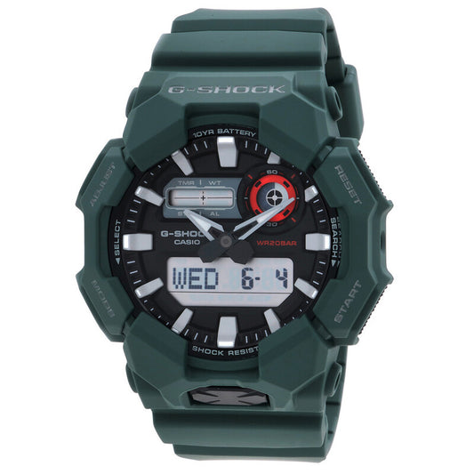 Casio G-Shock GA-010-2A with a black analog-digital dial, bold silver-tone hour markers, red dial accents, and a dark green resin case and strap.