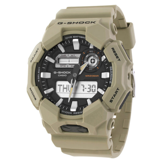 Casio G-Shock GA-010-5A men’s ana-digi watch with a black dial, dual digital displays, orange accents, rugged beige case, and matching beige resin strap.