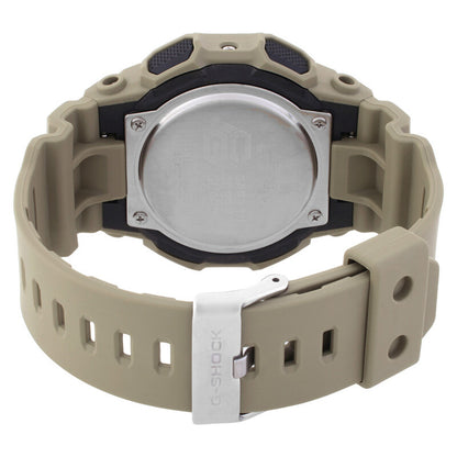 Casio G-Shock GA-010-5A from the rear with a metal caseback, rugged beige resin strap, multiple adjustment holes, and silver-tone G-Shock buckle.