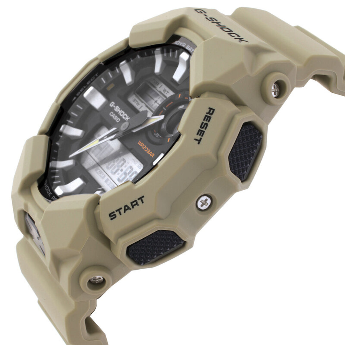 Casio G-Shock GA-010-5A watch in side profile with a rugged beige case, black textured side buttons, exposed screws, and black ana-digi dial with orange accents.