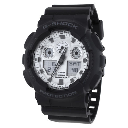 Casio G-Shock GA-100WD-1A with a white analog-digital dial, black shock-resistant case, and matching black resin band.
