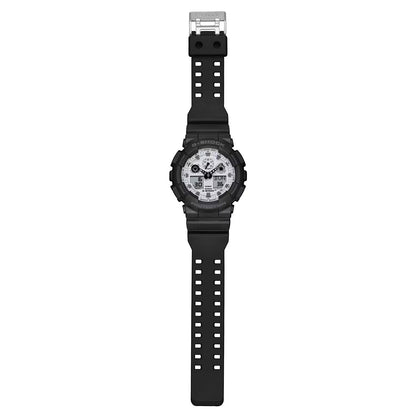 Casio G-Shock GA-100WD-1A full front with a white analog-digital dial, rugged black resin case, and matching black resin band with silver-tone buckle.