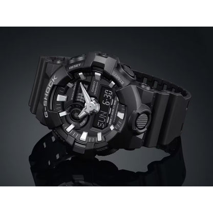 Casio G-Shock GA-700-1BCR men's ana-digi sport watch studio display on reflective dark surface