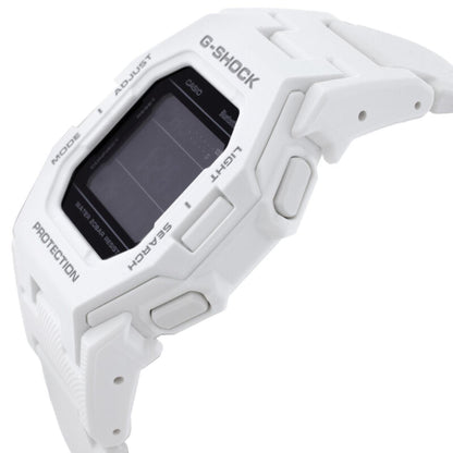 Angled view of the Casio G-Shock GD-B500-7 showing the white resin case, black digital display, side control buttons, and shock-resistant construction.
