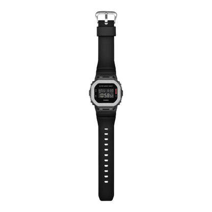 Casio G-Shock GM-5600BM-1 men's digital watch displayed flat with full black resin strap and buckle