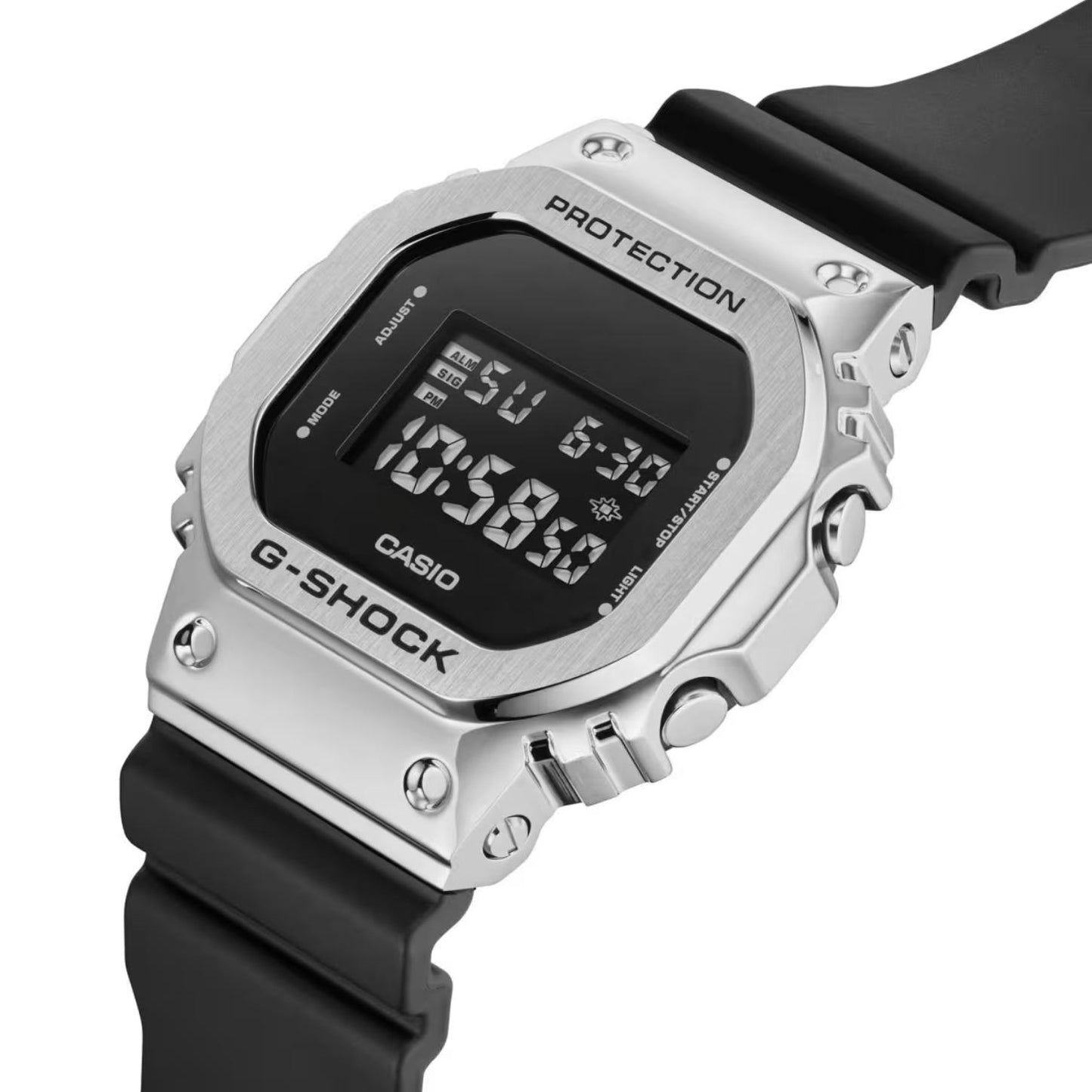 Casio G-Shock GM-5600U-1 with a rectangular digital display, brushed stainless steel bezel, silver-tone side buttons, and black resin band.