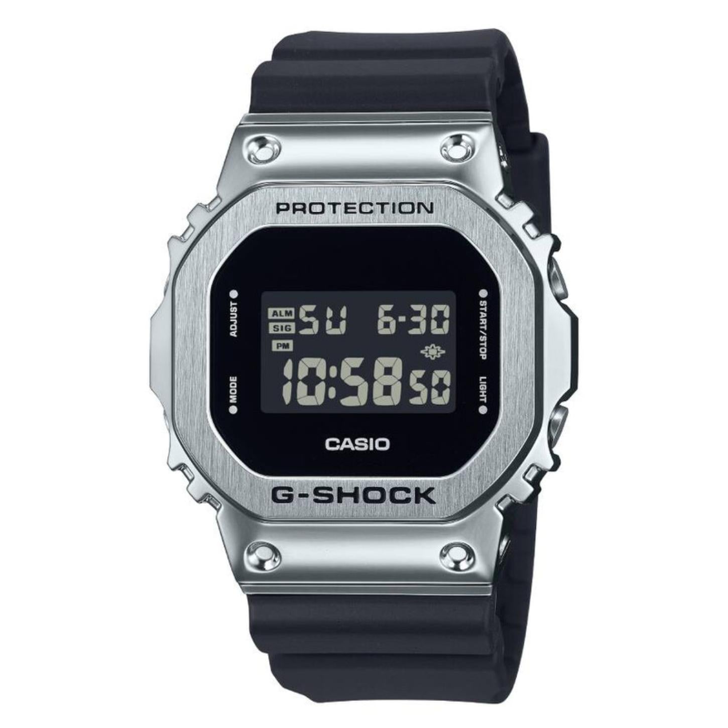Casio G-Shock GM-5600U-1 with a rectangular digital display, brushed stainless steel bezel, and black resin band.