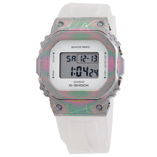 Casio G-Shock GM-S5640GEM-7DR women’s digital watch with a square digital display, iridescent rainbow-tone bezel with geometric patterning, and a translucent white strap.