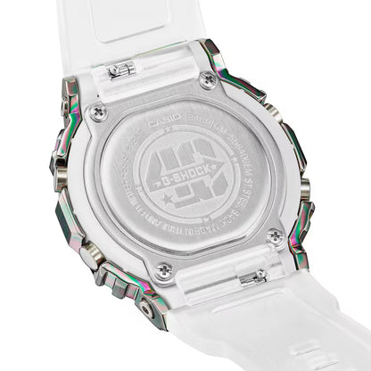 Casio G-Shock GM-S5640GEM-7DR women’s digital watch with an engraved stainless steel caseback, translucent white strap, visible rear screws, and iridescent rainbow-tone bezel edges.