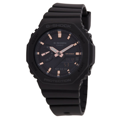Casio G-Shock GMA-S2100-1A with a black octagonal case, black dial, rose gold-tone hands and hour markers, and a matching black resin strap.
