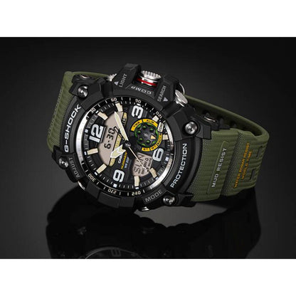 Casio G-Shock Mudmaster GG-1000-1A3 displayed against a dark background, featuring a rugged analog-digital dial, mud-resistant black case, and green resin strap.