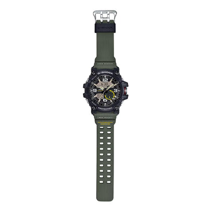 Full-length view of the Casio G-Shock Mudmaster GG-1000-1A3 showing the rugged analog-digital watch, black shock-resistant case, green resin strap, and metal buckle.