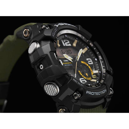 Angled side view of the Casio G-Shock Mudmaster GG-1000-1A3 showing the rugged black case, analog-digital dial, textured control buttons, and green resin strap.