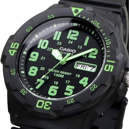 Casio MRW200H-3BV dive style sport watch close-up with black dial, green numerals, day-date display and black rotating bezel.