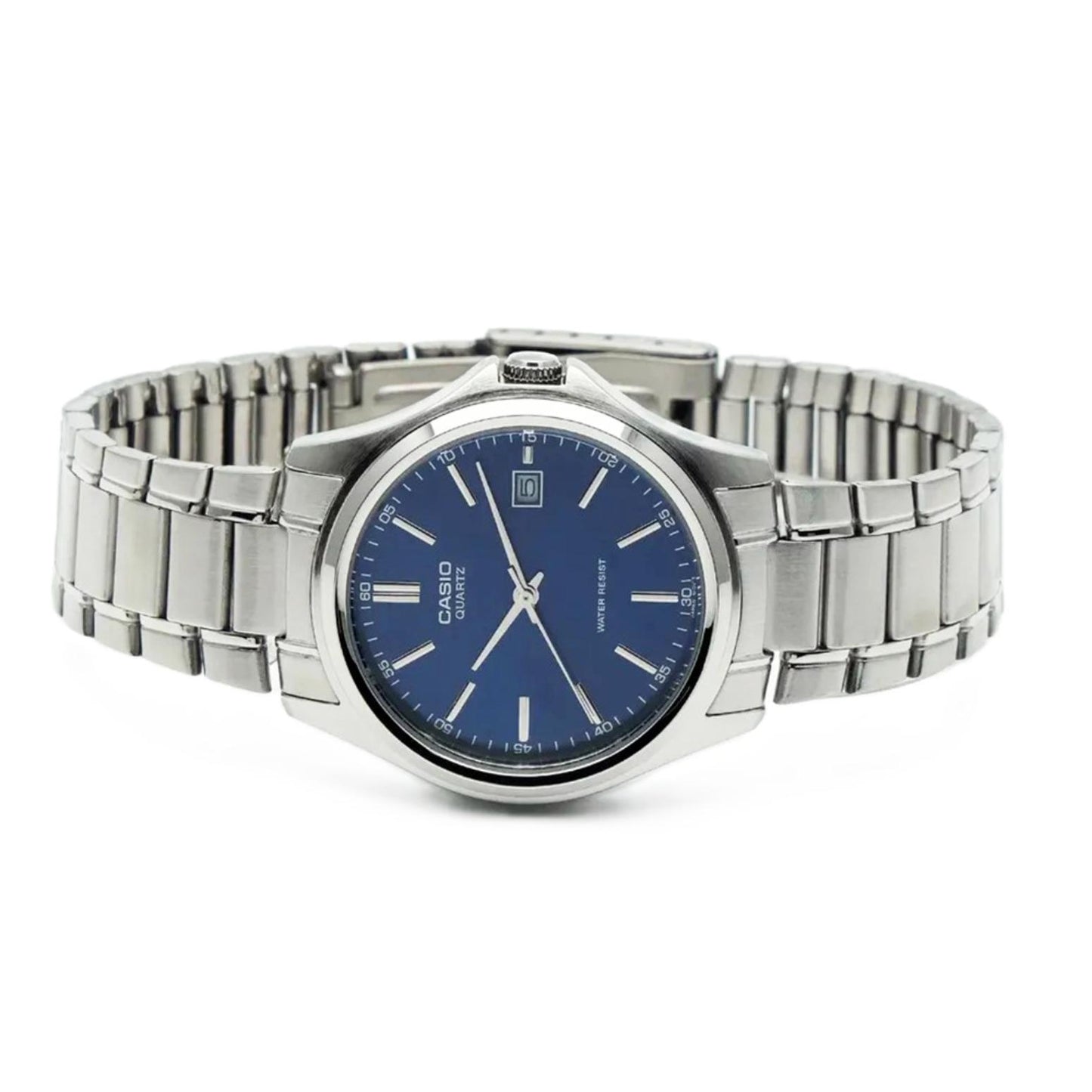 Casio MTP-1183A-2A men’s dress watch with blue sunray dial, date display and stainless steel bracelet displayed in a lifestyle setting.