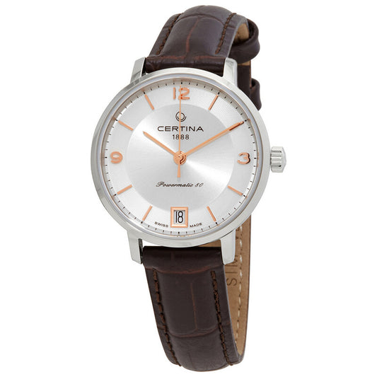 Certina DS Caimano women's automatic watch featuring a silver sunburst dial, rose gold-tone Arabic numerals, date window at six o'clock, and brown embossed leather strap