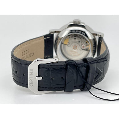 Parte trasera del Certina DS Caimano Lady Powermatic 80 C035.207.16.037.00 con fondo visto que muestra el movimiento automático y correa de piel negra con hebilla firmada.