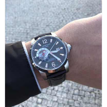 Certina DS Podium C034.455.16.087.01 men's quartz watch worn on the wrist, displaying the brown dial, stainless steel case, and brown leather strap.