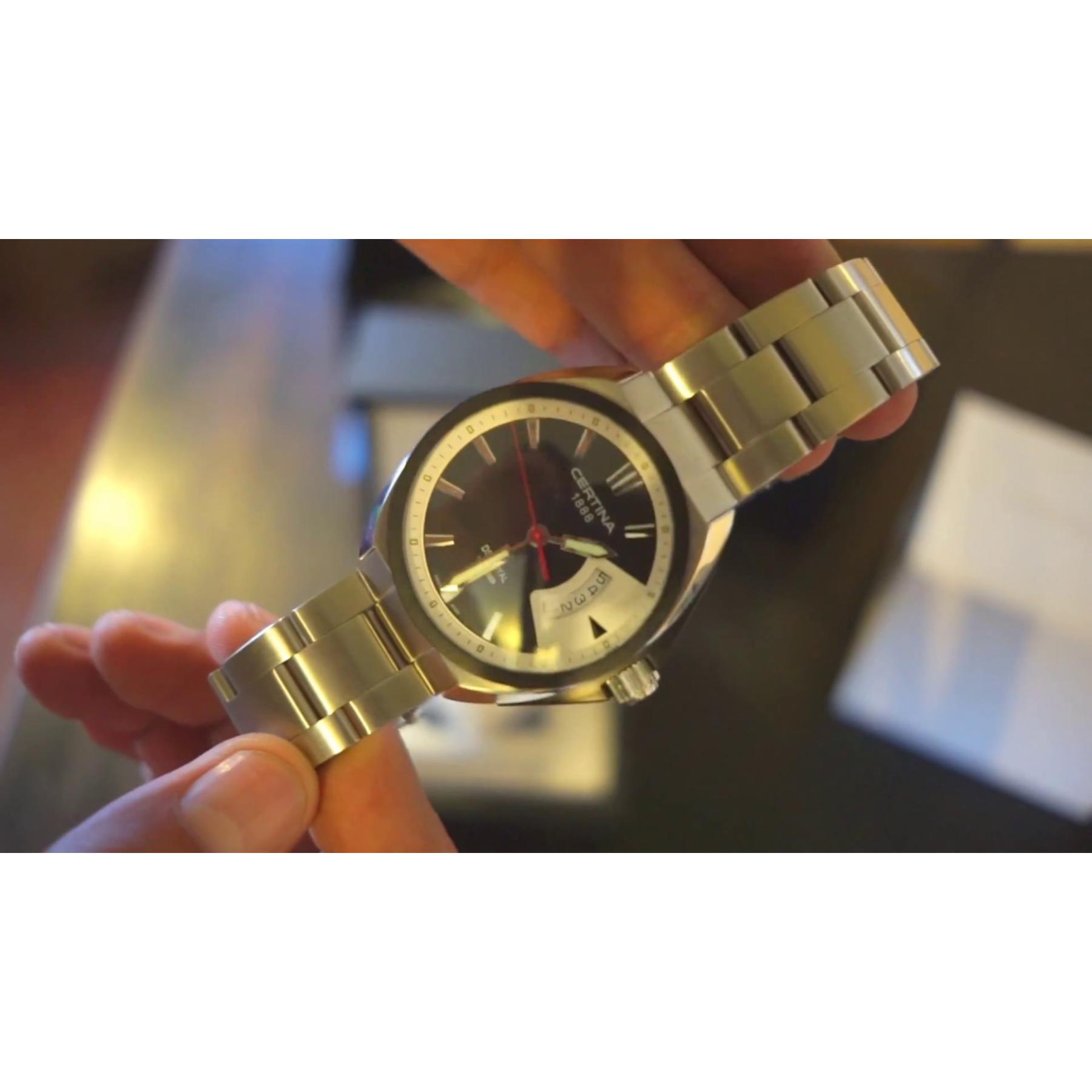 Certina DS Royal C010.410.11.051.00 con brazalete de acero inoxidable, caja redonda de acero, bisel oscuro y esfera de tono oscuro con fechador a las 3.